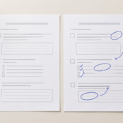 Two exam practice sheets with indigo feedback marks beside a timer.